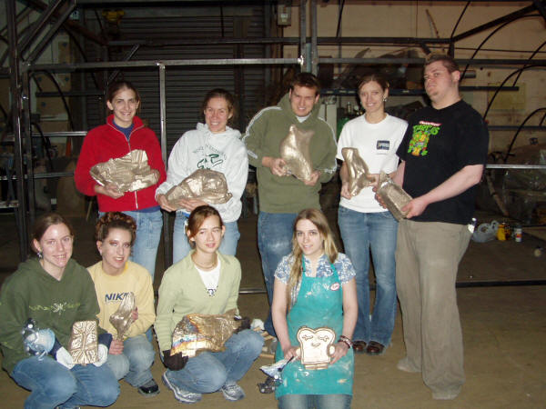 Sculpture Students with Finished Bronzes