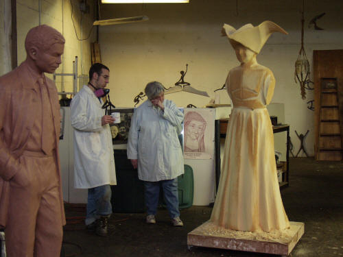 Jeremy Wolf and Gwen Gillen Inspect Enlargement