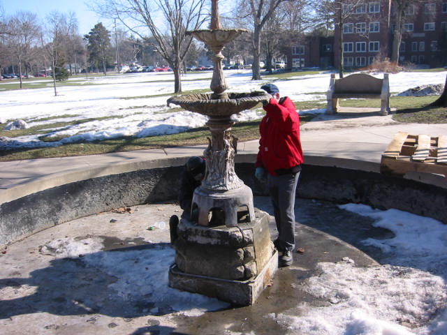 Fountain Shows One Entire Head Missing, Mineral Deposits and Corrosion