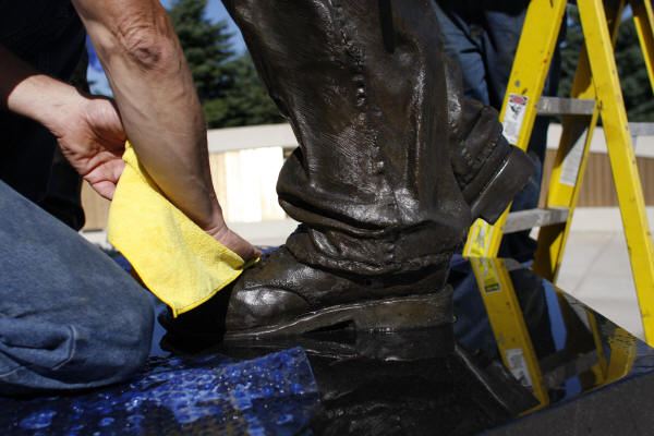 Cleaning and Drying "Teamwork" Sculpture